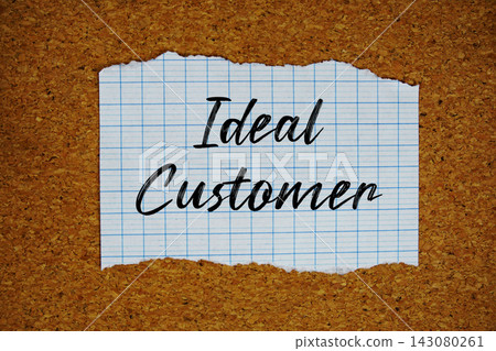 Ideal Customer text written on ripped paper piece Ideal Customer text written on ripped paper piece 143080261