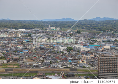 April 30 2026 Koriyama city skyline with mountains under overcast sky April 30 2026 Koriyama city skyline with mountains under overcast sky 143080674