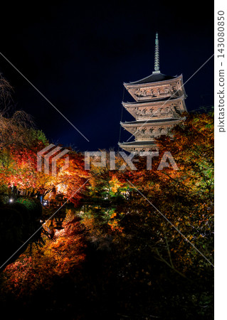 Nov 25 2025 Illuminated Pagoda and Autumn Maples Reflect in Pond 143080850
