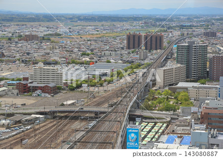 April 30 2026 Railway yard with multiple tracks and trains at station 143080887