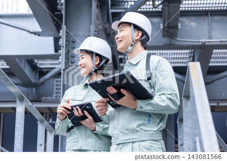 Building maintenance staff inspecting equipment. Photo courtesy of Denpa Gakuen, Tokyo Electronics College. Building maintenance staff inspecting equipment. Photo courtesy of Denpa Gakuen, Tokyo Electronics College. 143081566