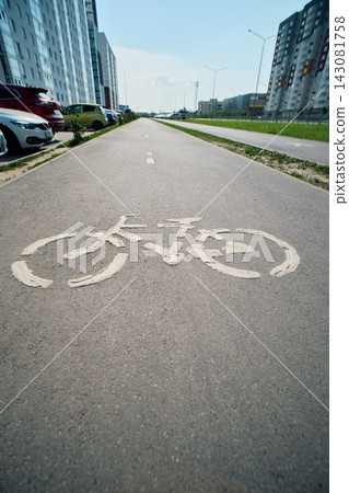 Bike Lane Symbol Painted on Asphalt in Residential Area Bike Lane Symbol Painted on Asphalt in Residential Area 143081758