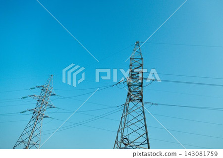Low angle close up view of a strategic electrical distribution framework grid Low angle close up view of a strategic electrical distribution framework grid 143081759