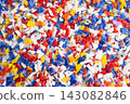 Plastic colorful pieces recycling shredded for industrial use. 143082846
