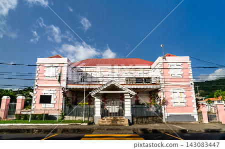 Exterior view of House of Assembly of Dominica on Victoria Street in Roseau under a clear blue sky. Exterior view of House of Assembly of Dominica on Victoria Street in Roseau under a clear blue sky. 143083447
