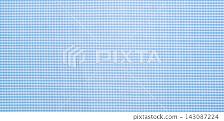 A textured background made of blue checkered fabric A textured background made of blue checkered fabric 143087224