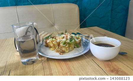 pancakes with salmon for breakfast in cafe pancakes with salmon for breakfast in cafe 143088123