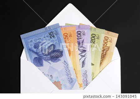 Syrian pound in a white envelope Syrian pound in a white envelope 143091045