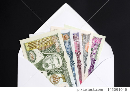 Mongolian tugrug in a white envelope Mongolian tugrug in a white envelope 143091046