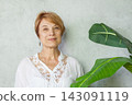 Healthy real woman 60s indoors 143091119