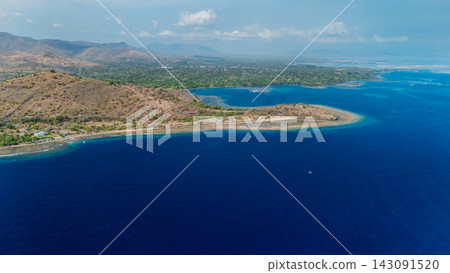 Bali with blue ocean and mountains in Pemuteran area, above view Bali with blue ocean and mountains in Pemuteran area, above view 143091520