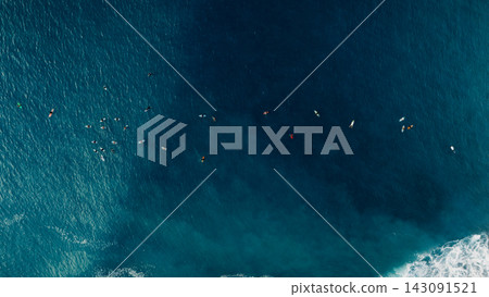 Drone view of perfect surf break over a tropical coral reef Drone view of perfect surf break over a tropical coral reef 143091521