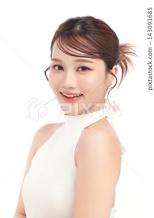 A beautiful young Asian woman with clean, fresh skin against a white background. Skincare, facial treatment, cosmetology, beauty, and spa. An elegant portrait of an Asian woman. A beautiful young Asian woman with clean, fresh skin against a white background. Skincare, facial treatment, cosmetology, beauty, and spa. An elegant portrait of an Asian woman. 143091685