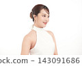 A beautiful young Asian woman with clean, fresh skin against a white background. Skincare, facial treatment, cosmetology, beauty, and spa. An elegant portrait of an Asian woman. 143091686