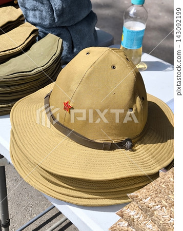 Soviet military Panama "Afghanka" with a red star at a vintage market Soviet military Panama "Afghanka" with a red star at a vintage market 143092199