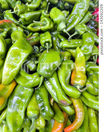 Bright and juicy close-up of ripe peppers on the counter Bright and juicy close-up of ripe peppers on the counter 143092209