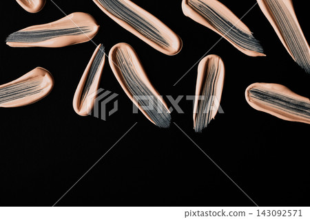 Creamy liquid foundation makeup swatches showing beauty cosmetic product texture Creamy liquid foundation makeup swatches showing beauty cosmetic product texture 143092571
