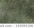 Traditional Japanese washi paper with its distinctive color variations and hand-rubbed texture. 143093106