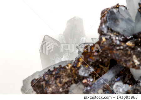 Macro mineral stone Drusus quartz with sphalerite in the rock a white background Macro mineral stone Drusus quartz with sphalerite in the rock a white background 143093963