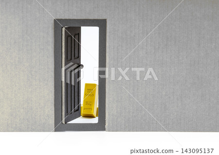 Conceptual image of a small black door standing open in a gray paper wall, revealing gleaming 999.9 fine gold bullion bars behind it, symbolizing stepping out into the world to find opportunity Conceptual image of a small black door standing open in a gray paper wall, revealing gleaming 999.9 fine gold bullion bars behind it, symbolizing stepping out into the world to find opportunity 143095137