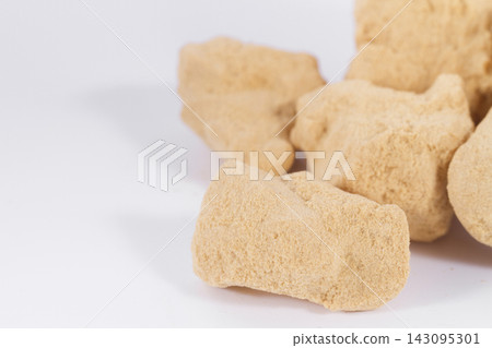 Brewer's yeast isolated on white background Brewer's yeast isolated on white background 143095301
