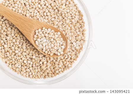 Quinoa grains in bowl isolated on white background, Chenopodium quinoa Quinoa grains in bowl isolated on white background, Chenopodium quinoa 143095421