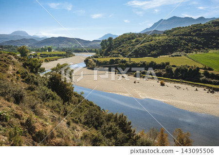 Autumn landscape of mountains with hills, river, and forests Autumn landscape of mountains with hills, river, and forests 143095506