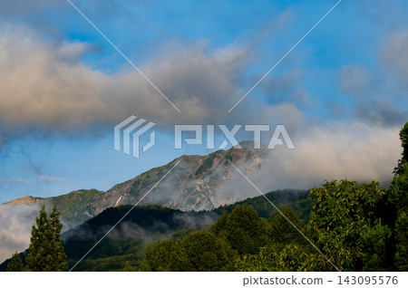 Mount Hakuba as seen from Tsugaike Plateau 143095576