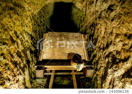 Wooden support structures and lanterns inside the tunnel 143096236