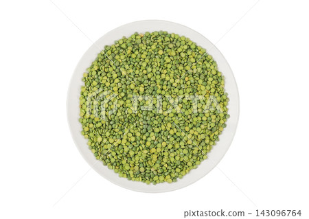 Dry green peas in a ceramic bowl isolated on a white background. Source of plant-based protein. Top view. Dry green peas in a ceramic bowl isolated on a white background. Source of plant-based protein. Top view. 143096764