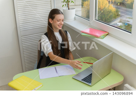 High School Student Having Online Lesson at Home High School Student Having Online Lesson at Home 143096894