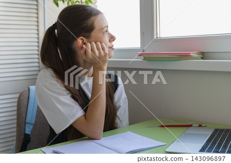 Bored High School Student Distracted During Online Study Bored High School Student Distracted During Online Study 143096897
