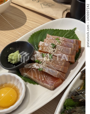 Korean soy sauce marinated raw salmon with sesame seeds and wasabi Korean soy sauce marinated raw salmon with sesame seeds and wasabi 143097142