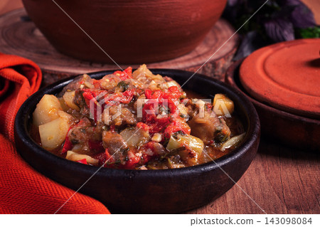 Chanakhi, a Georgian dish. in a clay pot, on a wooden table, stewed meat with vegetables, homemade, no people, Chanakhi, a Georgian dish. in a clay pot, on a wooden table, stewed meat with vegetables, homemade, no people, 143098084