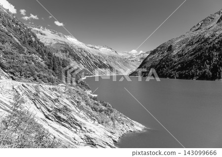 Beautiful alpine walley with azure blue water of Speicher Zillergrundl dam, Zillertal Alps, Austria. Black and white Photography Beautiful alpine walley with azure blue water of Speicher Zillergrundl dam, Zillertal Alps, Austria. Black and white Photography 143099666