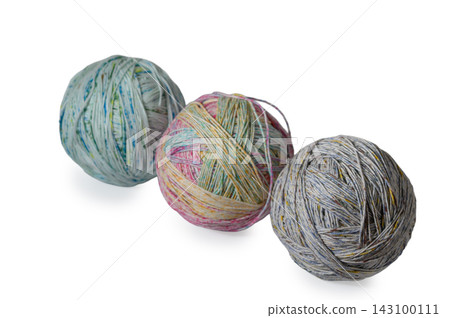 Colorful yarn balls invite creativity and warmth in a cozy crafting corner, ready for knitting or crocheting projects at home Colorful yarn balls invite creativity and warmth in a cozy crafting corner, ready for knitting or crocheting projects at home 143100111