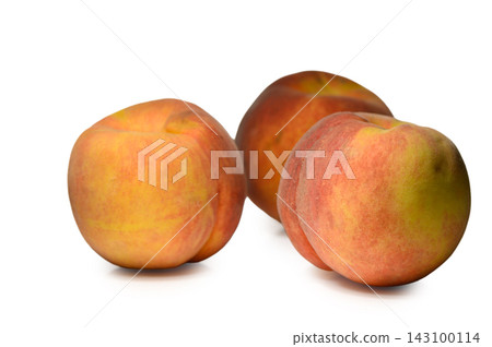 Commercial stock photo of three fresh ripe peaches arranged on a white background Commercial stock photo of three fresh ripe peaches arranged on a white background 143100114