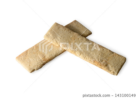 Two rectangular crispy wheat crispbread sticks on a white background Two rectangular crispy wheat crispbread sticks on a white background 143100149