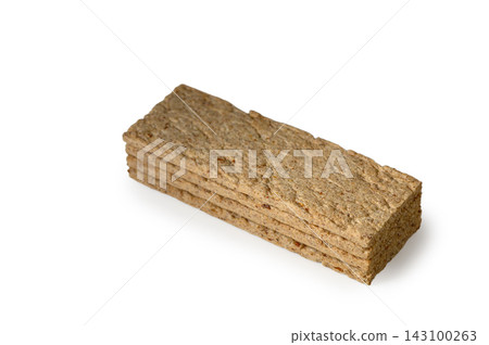 Stack of crispbread slices isolated on white background 143100263
