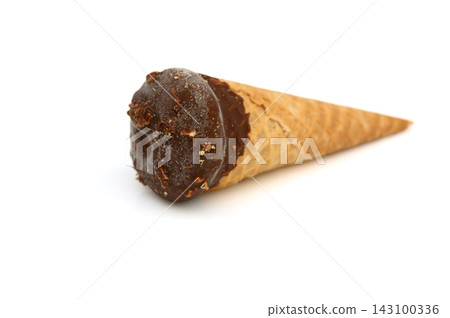 Commercial food photography of a chocolate-enrobed waffle cone ice cream isolated on a white background Commercial food photography of a chocolate-enrobed waffle cone ice cream isolated on a white background 143100336