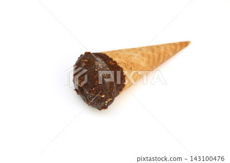 Commercial food photography of a chocolate-dipped waffle cone ice cream with crisp texture on a white background Commercial food photography of a chocolate-dipped waffle cone ice cream with crisp texture on a white background 143100476