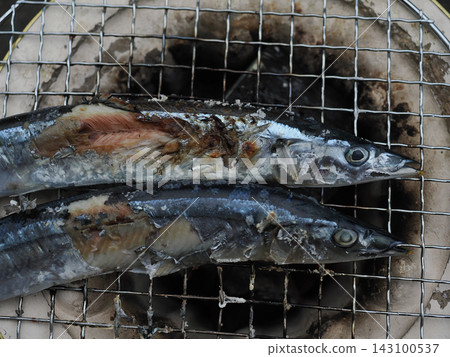 Saury grilled on a shichirin Saury grilled on a shichirin 143100537