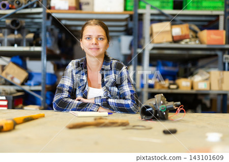 Portrait of positive woman warehouse worker Portrait of positive woman warehouse worker 143101609