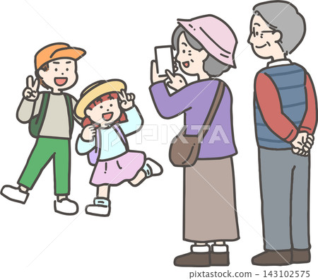 Senior couple taking photos of their grandchild with their smartphone Senior couple taking photos of their grandchild with their smartphone 143102575
