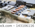 Close Up of Ammunition Belt Loaded Into Heavy Machine Gun 143106116