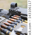 Close Up of Ammunition Belt Loaded Into Heavy Machine Gun 143106117