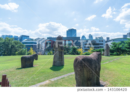 View of Queen Jeonghyeon's tomb at Seonjeongneung Royal Tombs with forest and cityscape, Seoul View of Queen Jeonghyeon's tomb at Seonjeongneung Royal Tombs with forest and cityscape, Seoul 143106420
