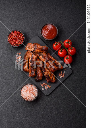 Grilled pork or beef ribs seasoned with salt and spices, served in sauce. Grilled ribs Grilled pork or beef ribs seasoned with salt and spices, served in sauce. Grilled ribs 143106611