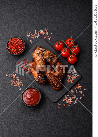 Grilled chicken wings with teriyaki sauce, seasoned with salt and spices. Chicken wings Grilled chicken wings with teriyaki sauce, seasoned with salt and spices. Chicken wings 143106615