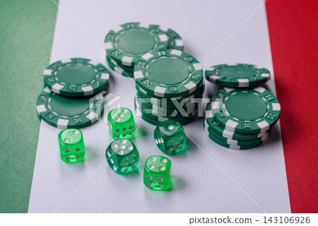 Playing cards, dice and chips on a table, a gambling game of blackjack. Cards, dice and chips Playing cards, dice and chips on a table, a gambling game of blackjack. Cards, dice and chips 143106926